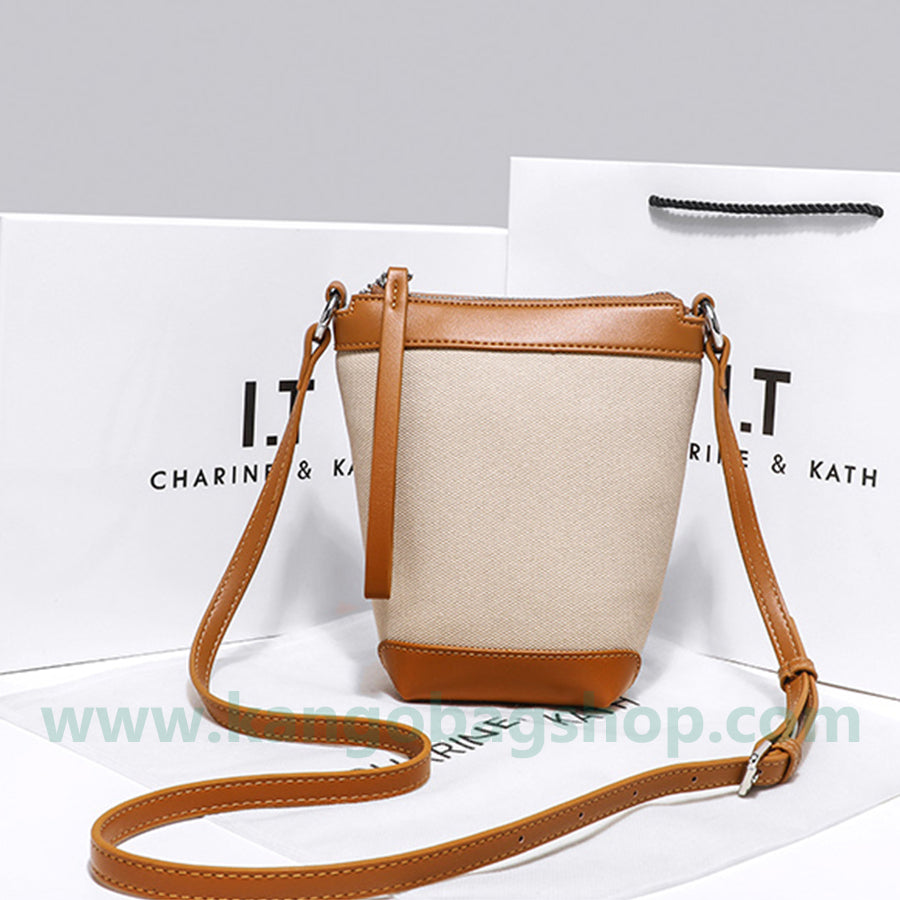 Korean department of high-end sense of multi-tie small bucket bag women's new fashionable one-shoulder messenger bag color bump mobile phone bag