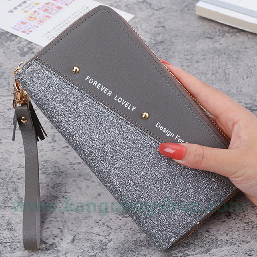 The New Purse Long Lady Zipper Purse Female Korean version of the collage tassel patchwork bag mobile phone bag